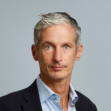 Andreas Bodczek head image with blue collared shirt